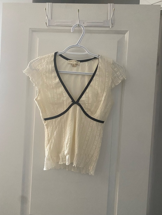 Anthropologie Tops - Cream Short Sleeve Top with Black Trim